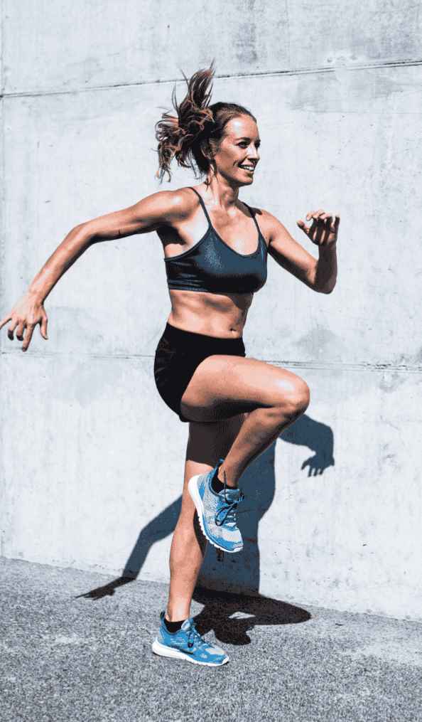 Female sprinting as part of her HIIT routine to give herself a fun challenge